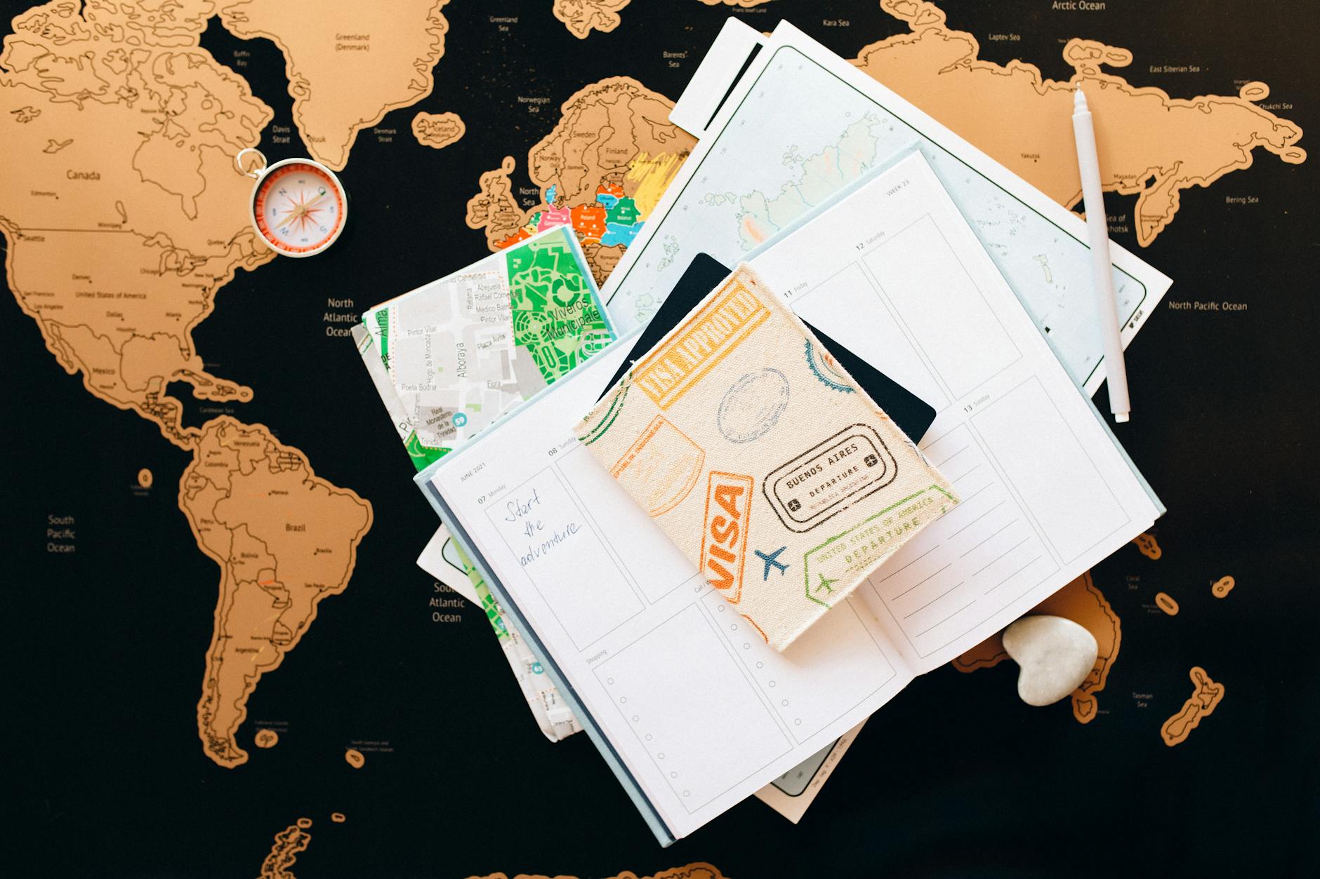 passport on top of a planner, Is Passport Required for Domestic Flights: Know the Essentials